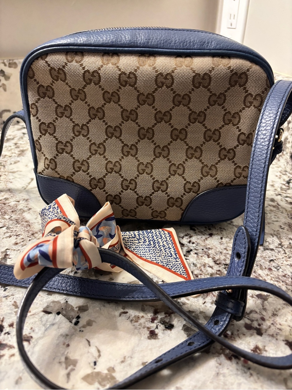 Authentic Gucci Bree GG Canvas Crossbody with Blue Leather Trim